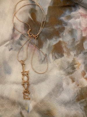 Pave love necklace